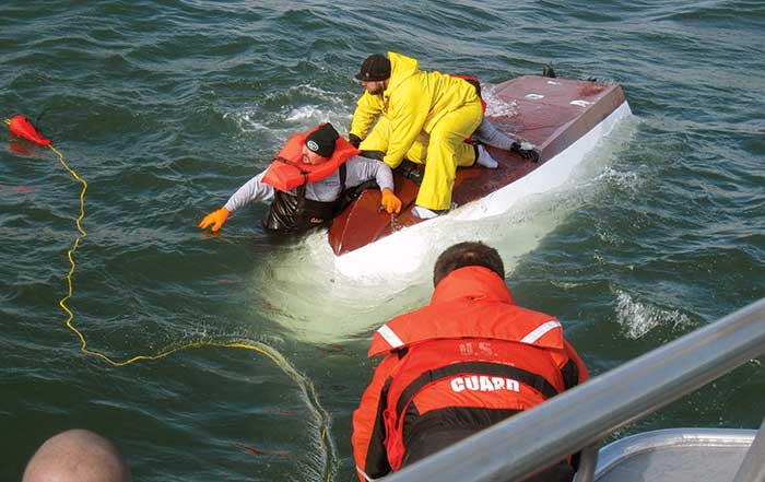 Your boat capsizes but remains afloat. What should you do? your-boat-capsizes